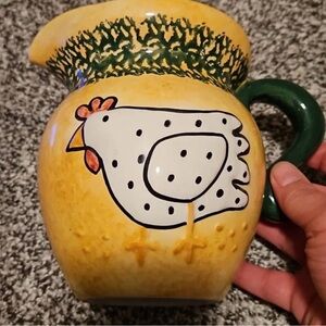 Yellow Ceramic Pitcher with Green Handle and Chicken Motif